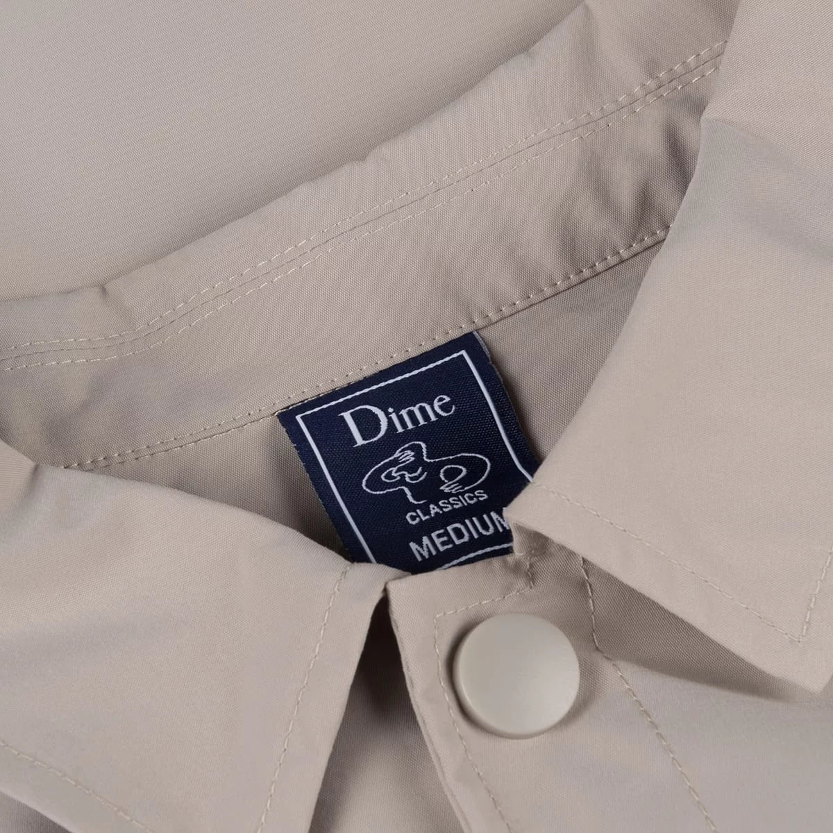 DIME - CHAQUETA CURSIVE COACH