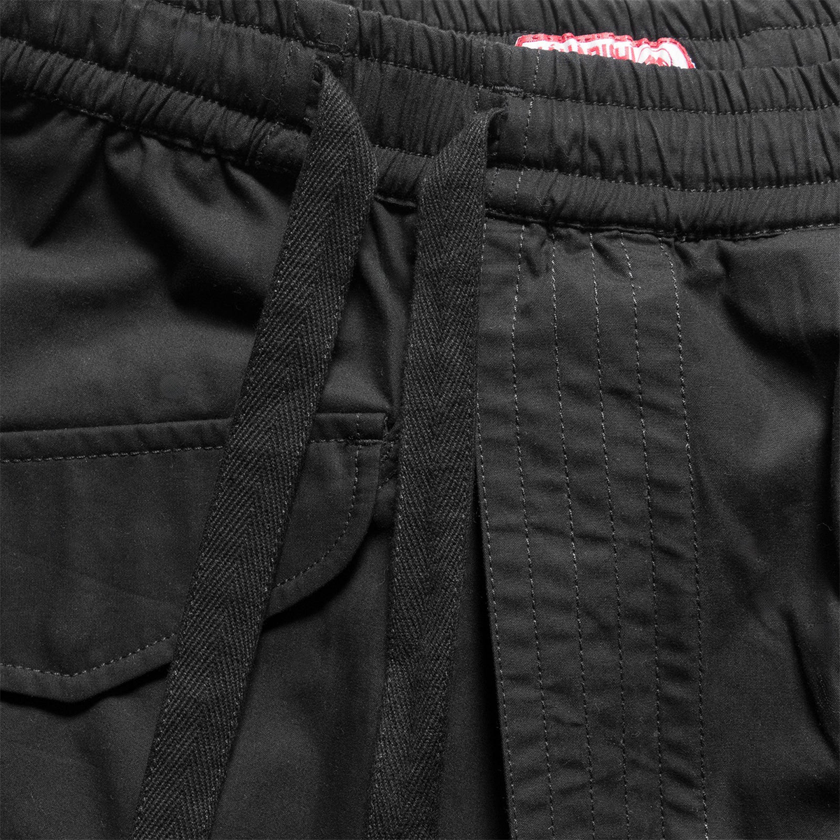 MAHARISHI - PANTALÓN CORTO ASYM HAKAMA