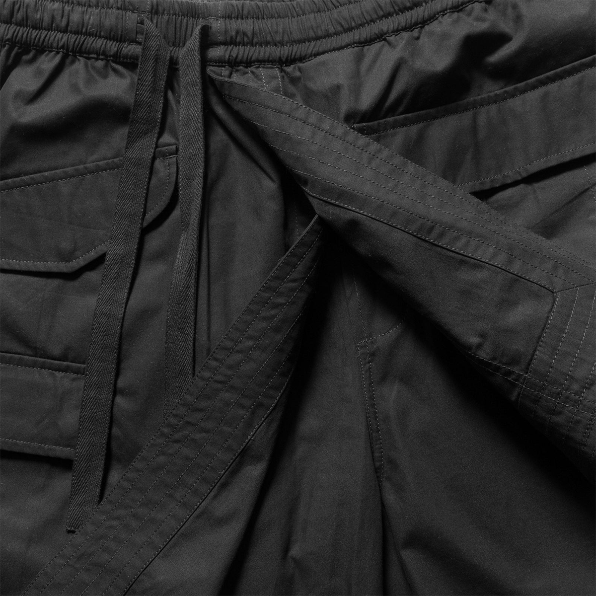 MAHARISHI - PANTALÓN CORTO ASYM HAKAMA